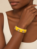 ATTICO yellow-faceted-bangle editorial portrait